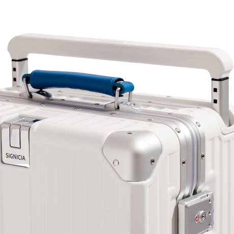 A wide telescopic handle with multiple height adjustments, engineered for balanced steering across different terrains.